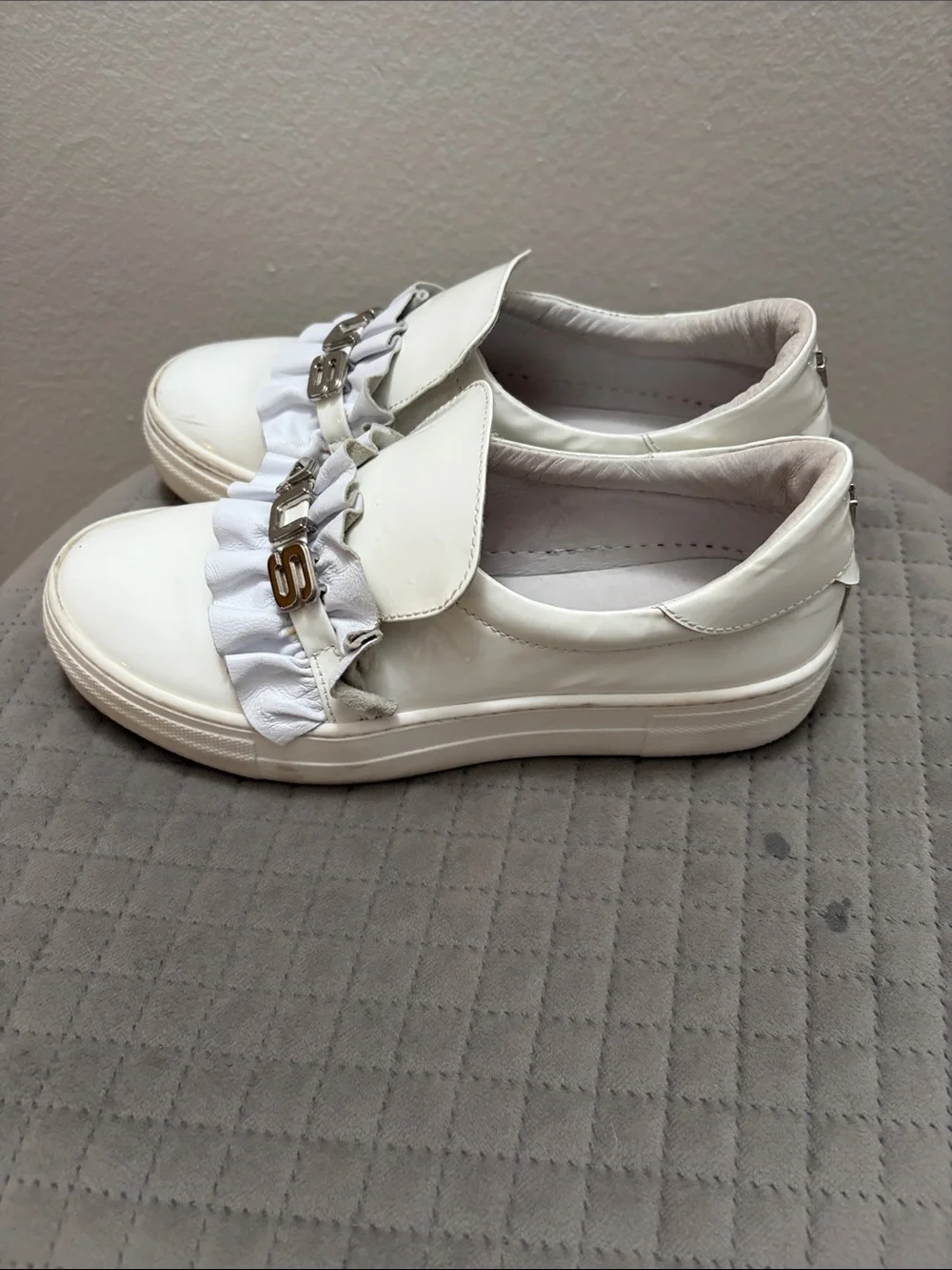 Cesare Paciotti White Patent Leather Slip-Ons with Ruffle Detail